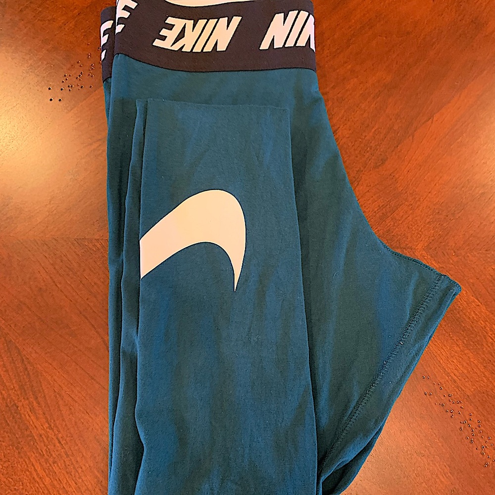Size medium teal blue Nike leggings